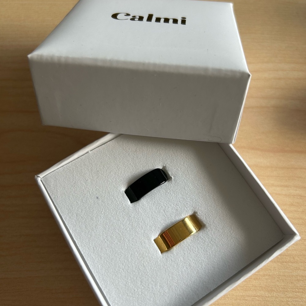 Calmi size 7 Black and Gold Ring